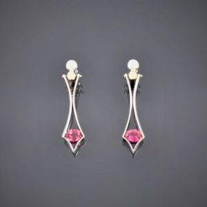 Silver and gold tension set tourmaline drop earrings. Secured with ball & stud