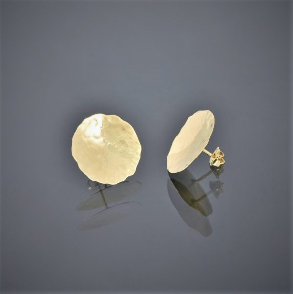 Front and side view of a pair of 18ct yellow gold stud earrings. The gold is thin, slightly concave with a beaten finish