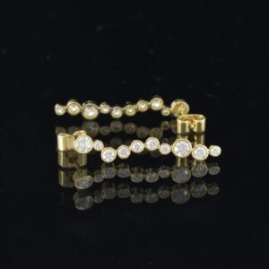 18ct gold multi-diamond drop earrings 3 cm long on black background