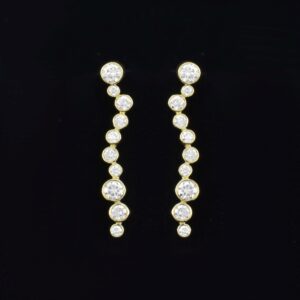 Front shot of 18ct gold multi-diamond drop earrings 3 cm long on black background